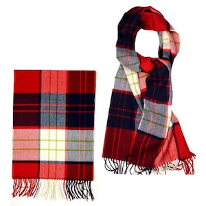May include: Red and navy blue plaid scarf with white and green accents. The scarf has fringe on the ends.