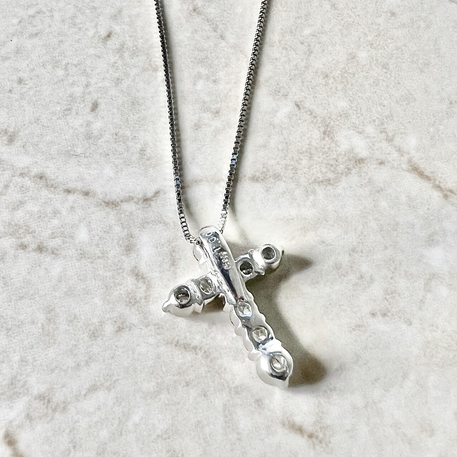 Platinum and diamond cross hotsell necklace
