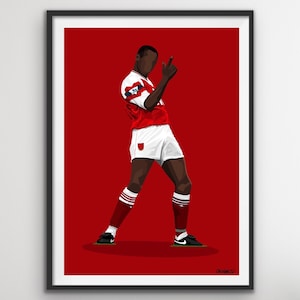 May include: A digital illustration of a soccer player in a red and white uniform celebrating a goal. The player is standing on a red background with a white outline around the image.