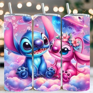 May include: Three stainless steel tumblers with colorful illustrations of the characters Stitch and Angel from the animated movie Lilo & Stitch. The tumblers feature a pink and blue color scheme with a space-themed background and include silver straws.