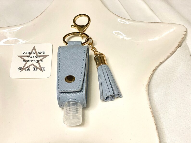 hand sanitizer keychain in dusty blue