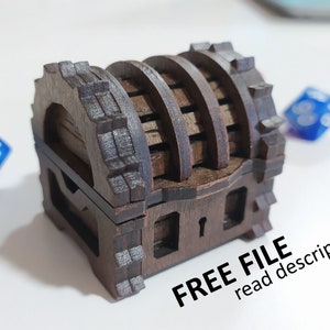 Könnte beinhalten: Eine kleine Holzkiste mit einem Scharnierdeckel und einem Schlüsselloch. Die Kiste ist mit aufwendigen Schnitzereien verziert und hat eine dunkelbraune Oberfläche. Der Text "FREE FILE read description" ist im Bild sichtbar.