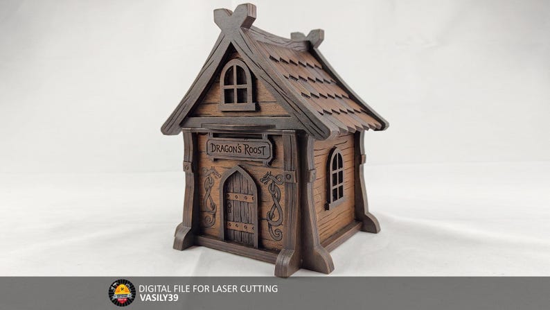 May include: A brown wooden model house featuring a gabled roof with shingle details, an arched door, and arched windows. A sign above the door reads Dragon's Roost. The structure includes engraved dragon motifs on the front panels and text at the bottom.