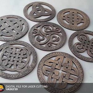 May include: Seven wooden coasters with intricate Celtic knot designs. Each coaster features a different knot pattern in a dark brown color.