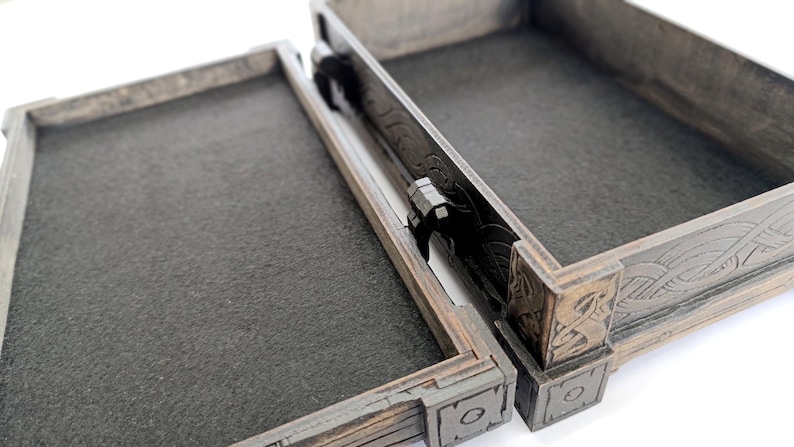 Laser cut storage box pattern shown as a completed physical item.