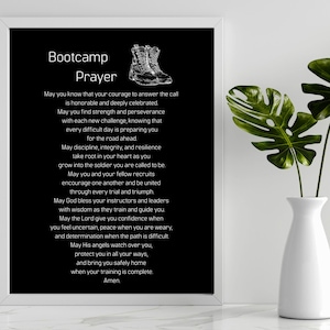 May include: A framed black wall art print featuring the white text Bootcamp Prayer and a line drawing of a pair of military boots. The text includes a prayer for recruits, beginning with May you know that your courage to answer the call.