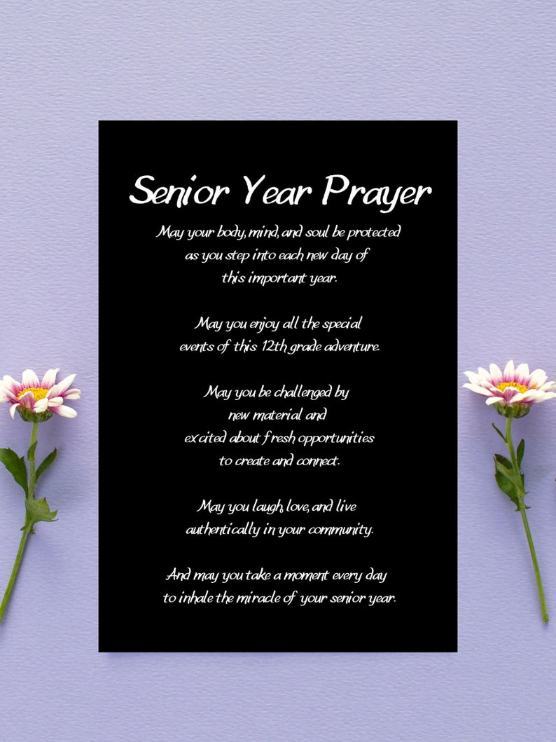 May include: A black card with white text that reads "Senior Year Prayer". The text is a prayer for a senior in high school, wishing them well in their final year. The card is surrounded by white flowers on a light purple background.