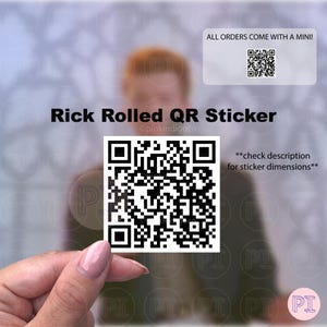 May include: A white sticker featuring a black QR code, with the text "Rick Rolled QR Sticker." The sticker also includes the text "ALL ORDERS COME WITH A MINI!" and "**check description for sticker dimensions**."