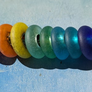 3 Seaglass and sterling silver beads encasing ashes
