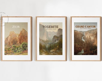 May include: Three framed vintage-style travel posters featuring scenic landscapes of national parks. The posters are titled "Zion", "Yosemite National Park", and "Grand Canyon National Park".