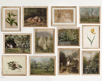 May include: A collage of 10 framed vintage botanical prints and paintings. The prints feature images of flowers, rabbits, and birds. The frames are all gold and have a simple design.