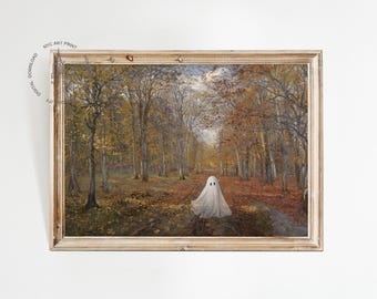 May include: Framed art print depicting a forest scene in autumn. A white ghost figure walks down a path lined with trees. The artwork is in a gold-colored frame and is set against a white background. The print is labeled "NYC ART PRINT".