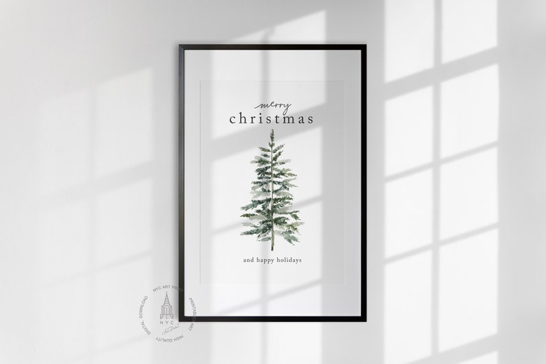 May include: A framed print with a watercolor illustration of a green Christmas tree and the text "merry christmas and happy holidays".