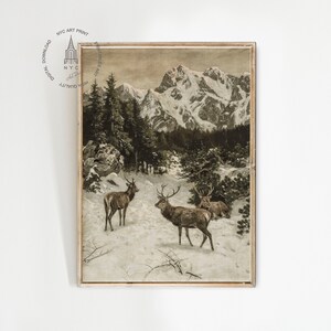 May include: A vintage illustration depicting a snowy mountain landscape with three deer in the foreground. The deer are brown and have large antlers. The mountains are covered in snow and the sky is a light blue.