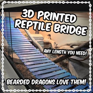 May include: A 3D printed reptile bridge with blue and purple slats. The image includes text that reads "3D PRINTED REPTILE BRIDGE" and "ANY LENGTH YOU NEED!" and "BEARDED DRAGONS LOVE THEM!"