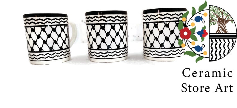 May include: Three white ceramic mugs with black geometric patterns. The mugs have black rims and handles. The mugs are arranged in a row from left to right. The image also includes a logo for "Ceramic Store Art" with a stylized tree and floral design.