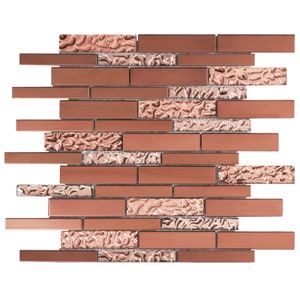 May include: A sheet of rose gold mosaic tiles with a mix of smooth and textured finishes. The tiles are arranged in a brick pattern.