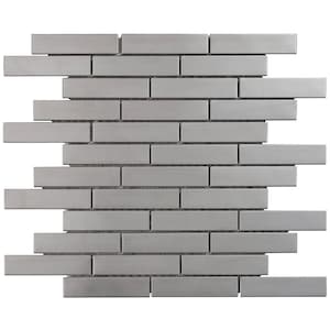 May include: A sheet of metallic silver subway tile with a brushed finish. The tiles are arranged in a staggered pattern.