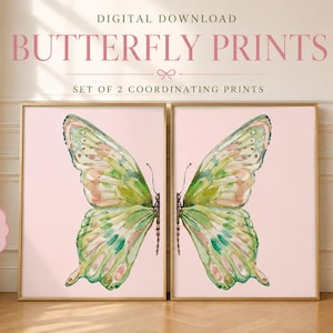 May include: A set of two digital download butterfly prints featuring a watercolor-style butterfly split across two frames. The artwork displays green, pink, and white hues on a light pink background. Text reads: DIGITAL DOWNLOAD BUTTERFLY PRINTS.