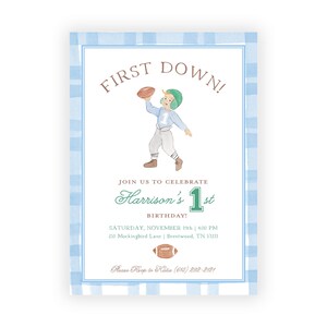 May include: A blue and white gingham patterned invitation for a first birthday party. The invitation features a cartoon illustration of a boy wearing a football uniform and holding a football. The text on the invitation reads "First Down!" and "Join us to celebrate Harrison's 1st Birthday!"  The invitation also includes the date, time, and location of the party, as well as a phone number to RSVP.