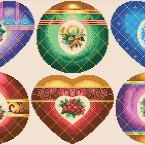 May include: Six heart-shaped Christmas ornaments with gold trim and various designs. The ornaments feature a candle, a snowflake, a poinsettia, a bunch of grapes, a trumpet, and a poinsettia.