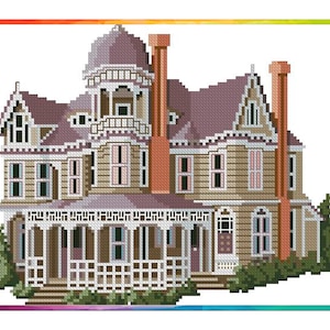 May include: A detailed cross-stitch pattern of a large, multi-story Victorian house with a wraparound porch, multiple chimneys, and a cupola on the roof. The house is painted in shades of brown, beige, and white, with accents of pink and green.