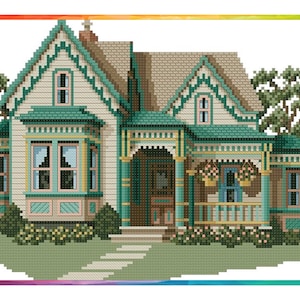 May include: A cross-stitch pattern of a green and white Victorian house with a porch and flower boxes. The house has a brown roof and a green lawn.