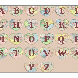 May include: A colorful alphabet chart with each letter in a patchwork heart shape. The letters are in a red font and the hearts are in various shades of pink, blue, green, and yellow.