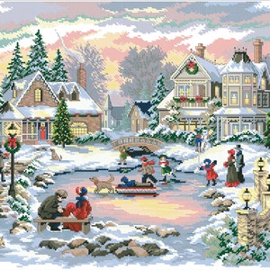 May include: A snowy winter scene with a frozen pond where people are ice skating.  There are two houses decorated for Christmas with lights and wreaths.  A bridge crosses the pond and a dog runs on the ice.