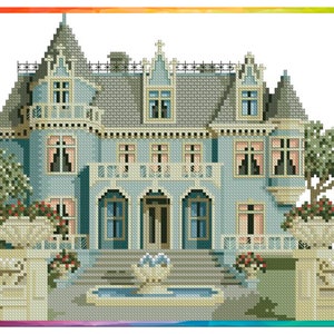 May include: A cross-stitch pattern of a blue and white Victorian mansion with a fountain in front. The house has a gray roof, white trim, and many windows. There are trees and flowers in the yard.