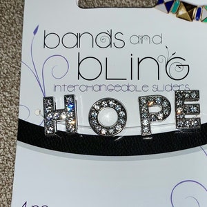 Silver Interchangeable Sliders with Rhinestones Spell Out the Word &quot;Hope&quot; 4 Pieces in package- New in Packaging