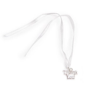 May include: White satin ribbon with a silver charm that says "Thank You".