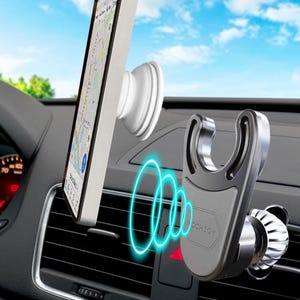 May include: A car phone mount with a silver and gray design, holding a smartphone displaying a map. The mount features a suction cup and a cradle. The brand name "ECCHJOY" is visible on the mount.