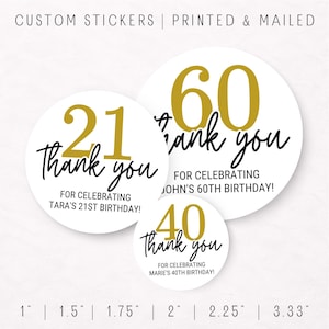 May include: White round stickers with gold numbers and black script reading "Thank you." The stickers are for birthdays, with ages 21, 40, and 60. The text "Custom Stickers | Printed & Mailed" is at the top.