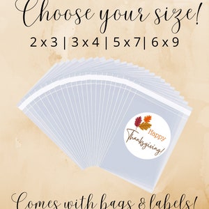 May include: A stack of clear plastic bags with labels that say "Happy Thanksgiving!" with fall leaves. The bags are available in four sizes: 2x3, 3x4, 5x7, and 6x9 inches.