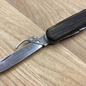 Swiss army 91 mm One-handed hooks for blades for SAK 91 mm titanium Hook for a blade installed on all 91 mm blades and all models knives 91