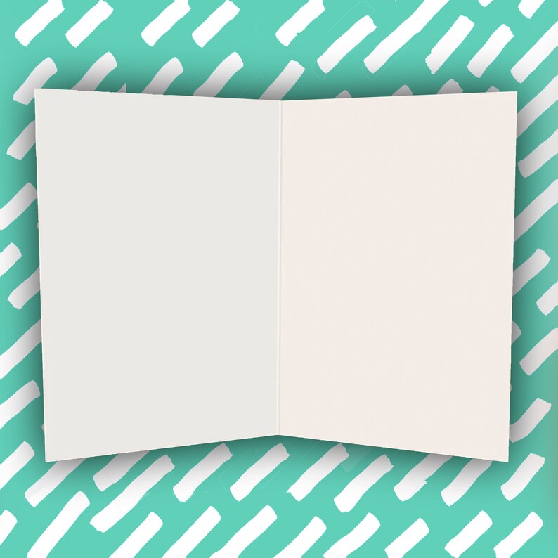 May include: A blank white card with a folded edge, sitting on a turquoise background with a white diagonal stripe pattern.