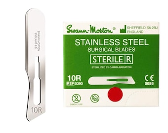 May include: A pack of 10 sterile surgical blades, labeled "Swann-Morton Stainless Steel Surgical Blades Sterile R" with a red dot and a single use symbol. The blades are sterilized by gamma radiation and have a CE mark.