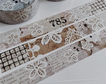 Fita adesiva decorativa com colagem e detalhes em renda, ideal para scrapbooking e decoração de diários.