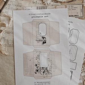 May include: Printable set of envelopes with a floral design and a blank space for writing. The envelopes are made for personal use only. The text "Albumlovehandmade" is printed on the bottom of the page.