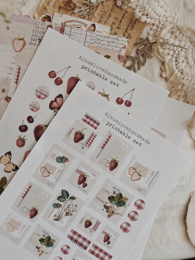 May include: Printable sticker sheet with a red and white gingham pattern, strawberries, butterflies, and cherries. The sheet includes the text "Albumlovehandmade printable set".