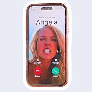 May include: A smartphone screen displaying a FaceTime video call from "Angela." The screen shows a woman with blonde hair and a stern expression. The interface includes "Decline" and "Accept" buttons.