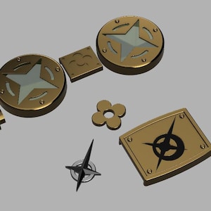 May include: A set of gold-colored metal charms with star and compass designs. The charms have a textured surface and are perfect for adding a touch of whimsy to jewelry or crafts.