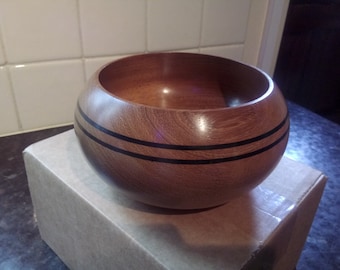 Hand turned Sapele wooden bowl with 2 black boxwood inlays. No 164.