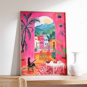 May include: A framed illustration of a pink and orange patio scene with a woman playing a guitar, a table with fruit, and a view of a town through an archway.