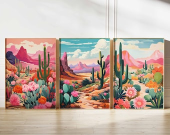 May include: Three framed prints of desert landscapes with cacti, mountains, and pink flowers. The prints are in a modern style with vibrant colors.