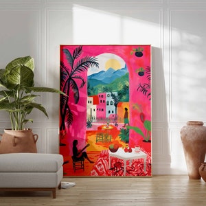 May include: A colorful painting depicting a scene of a tropical courtyard with a woman sitting on a chair and a woman walking away. The painting is framed and hanging on a white wall.