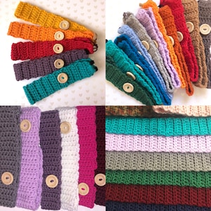 May include: Assortment of colourful crocheted headbands with wooden buttons. The headbands are made with different colours of yarn, including teal, purple, pink, white, and grey.