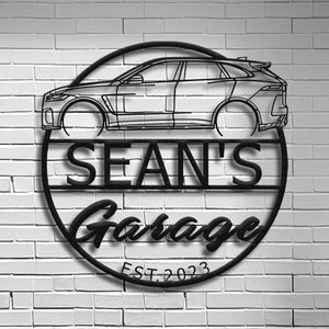 May include: Black metal sign with a silhouette of a car, the text "Sean's Garage" and the date "EST. 2023".