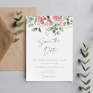 May include: Save the Date card with a floral design featuring pink roses and green leaves. The text reads "Save the Date", "Emily Brown and Richard Carter are getting married", "Saturday 15th August 2016", and "Holmewood Hall, Hall Drive, Cambridge", with the words "Invitation to follow" at the bottom.